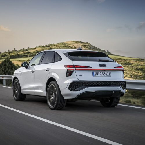 Glacier white metallic, dynamic outdoor shot, exterior, rear three-quarter view